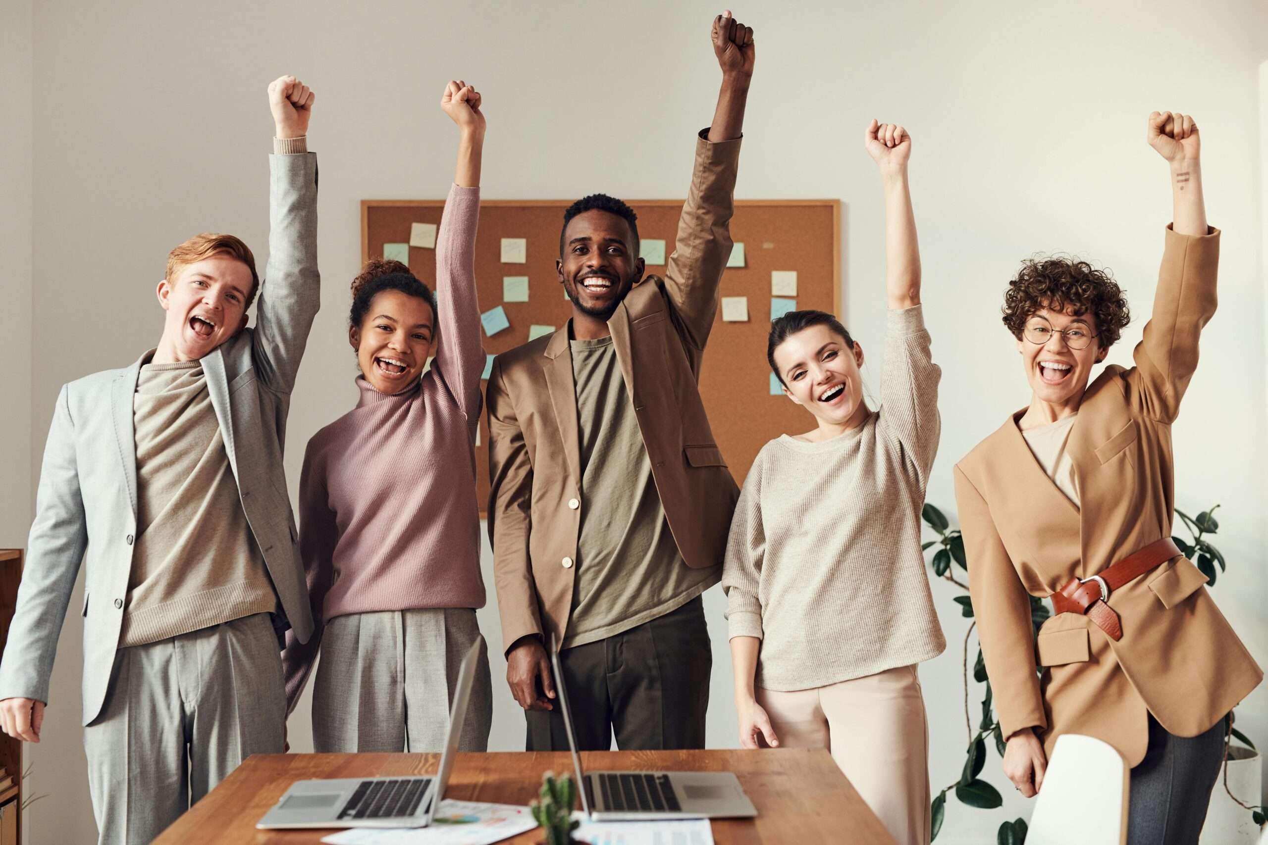 Team celebrating workplace success together