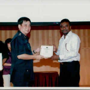 Certificate award presentation at formal event
