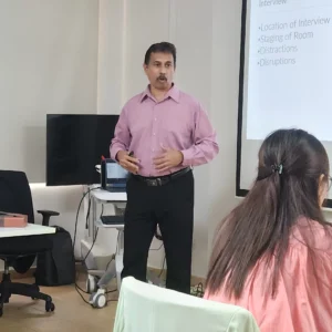 Trainer conducting workshop presentation