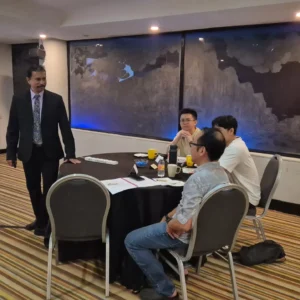 Trainer guiding participants during workshop