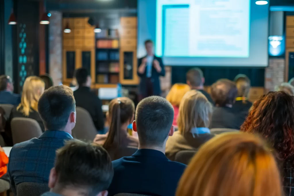 Audience attending a business presentation