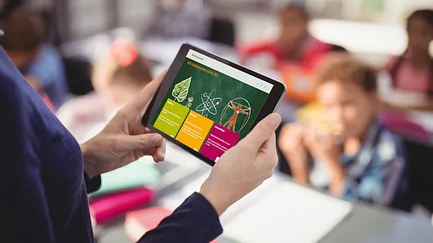 Person using tablet for digital learning