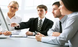 Business professionals discussing workplace communication